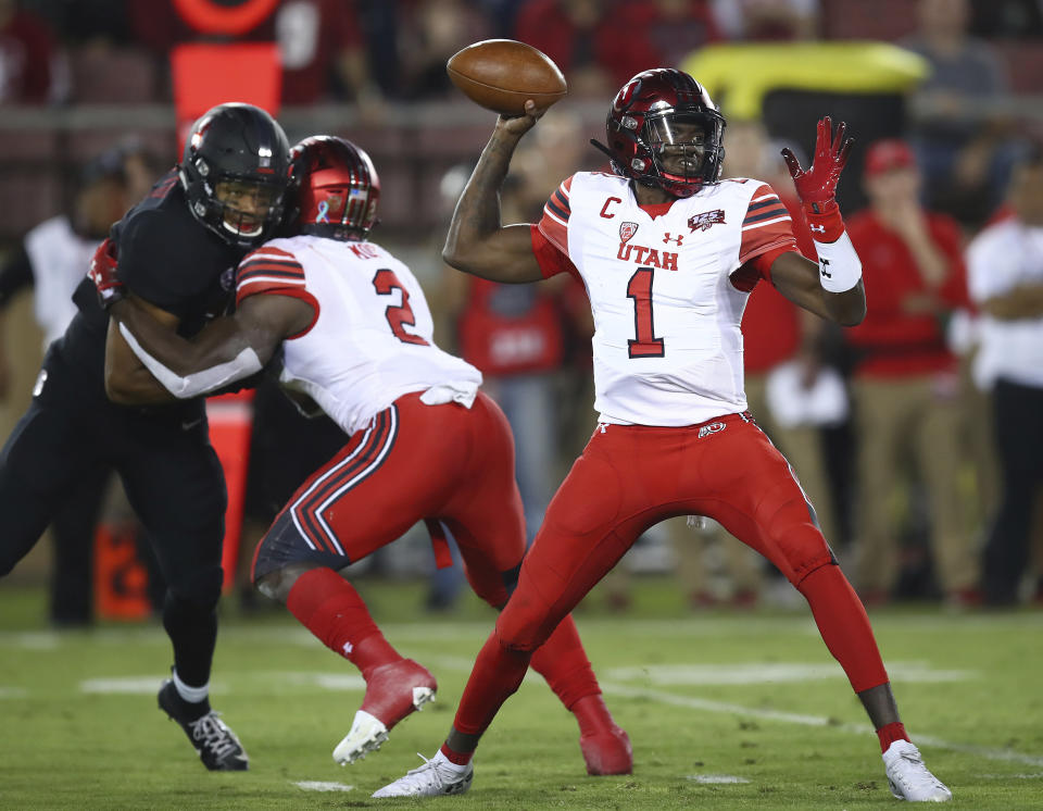 Utah quarterback Tyler Huntley (1) throws a pass against Stanford during the first half of an NCAA college football game Saturday, Oct. 6, 2018, in Stanford, Calif. (AP Photo/Ben Margot)