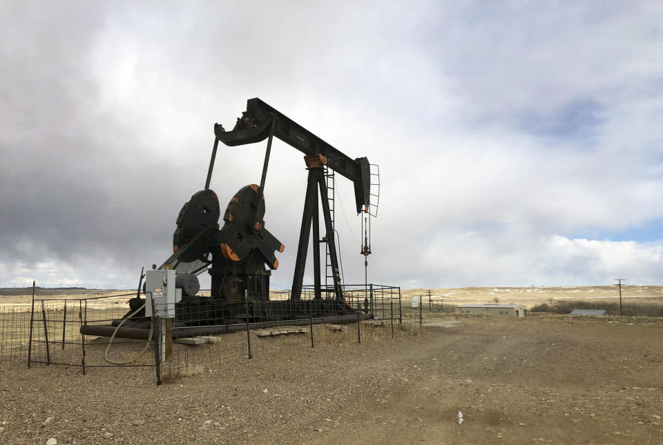 An oil well is seen east of Casper, Wyo., on Feb. 26, 2021. President Joe Biden's administration is at odds with the petroleum industry in the Rocky Mountain region and beyond for imposing a moratorium on leasing federal lands for oil and gas production. (AP Photo/Mead Gruver)