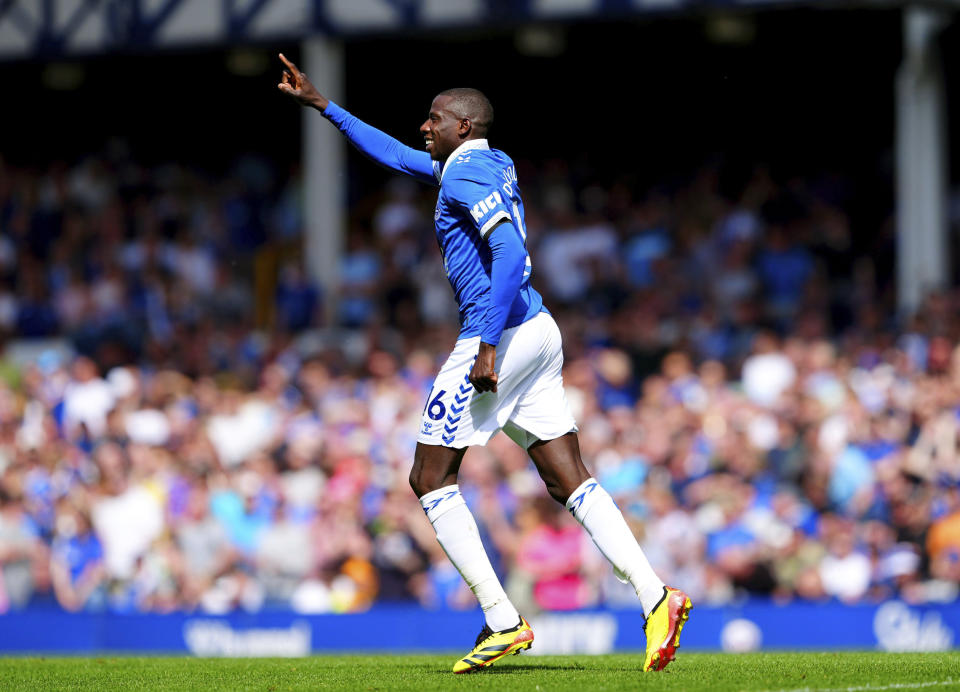 Everton's Abdoulaye Doucoure celebrates after scoring his side's first goal of the game, during the English Premier League soccer match between Everton and Sheffield United, at Goodison Park, in Liverpool, England, Saturday May 11, 2024. (Peter Byrne/PA via AP)