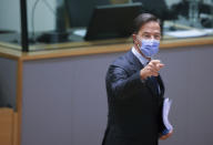 Dutch Prime Minister Mark Rutte arrives for a round table meeting at an EU summit in Brussels, Friday, Oct. 22, 2021. European Union leaders conclude a two-day summit on Friday in which they discussed issues such as climate change, the energy crisis, COVID-19 developments and migration.(AP Photo/Olivier Matthys, Pool)