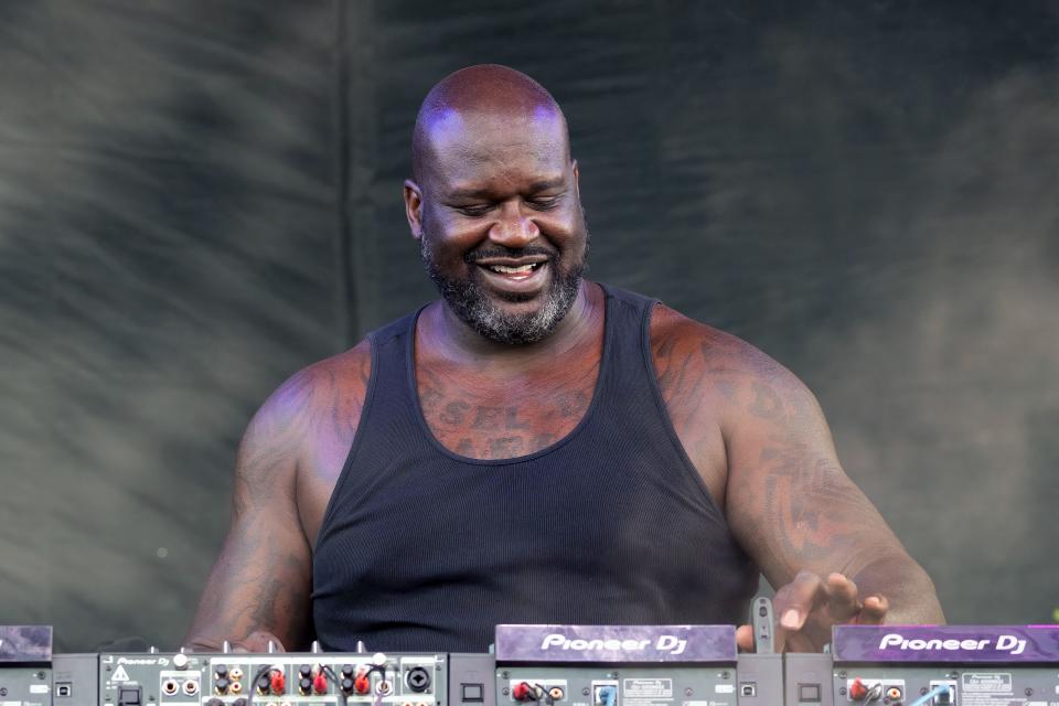 Shaquille O'Neal working as a DJ.