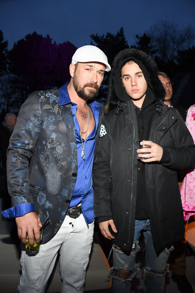 <p>Here is Jeremy Bieber, who for sure has a favorite Staind album, pictured with his son, musician Justin Bieber, who is contemplating world hunger. This picture really gives you a good look at the collarbone tattoo you already knew Jeremy Bieber had. </p>