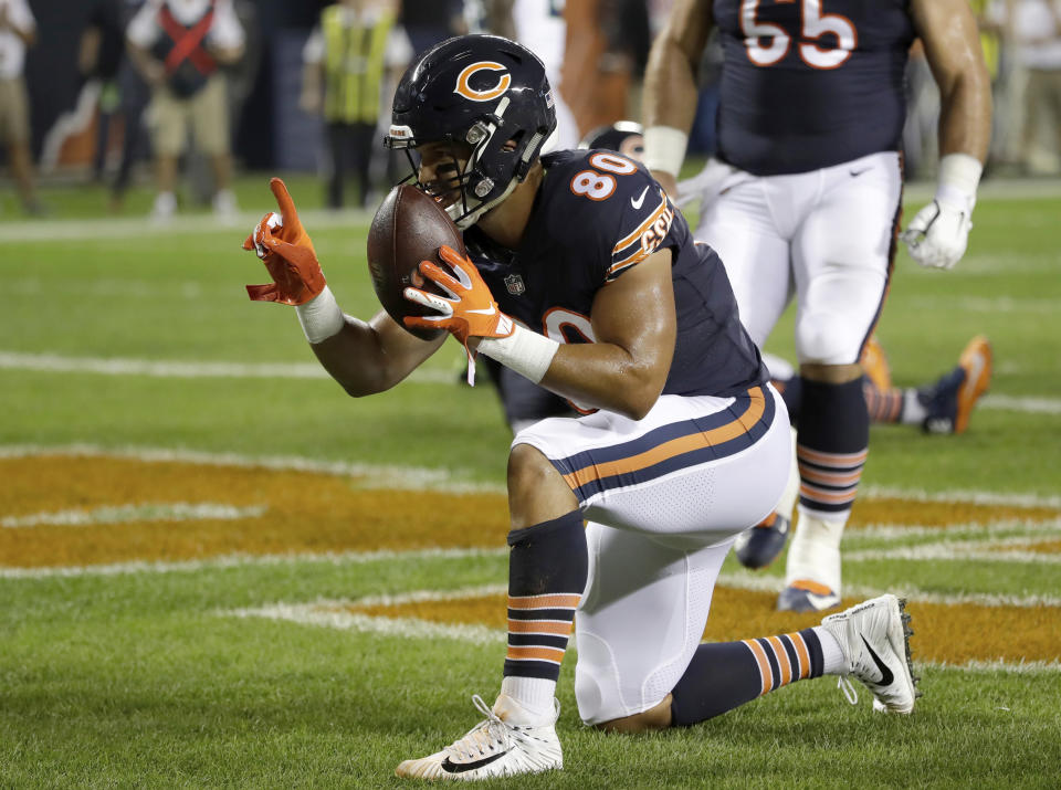 CORRECTS TO TREY BURTON (80) NOT DION SIMS (88) - Chicago Bears tight end Trey Burton (80) celebrates his touchdown during the first half of an NFL football game against the Seattle Seahawks, Monday, Sept. 17, 2018, in Chicago. (AP Photo/Nam Y. Huh)