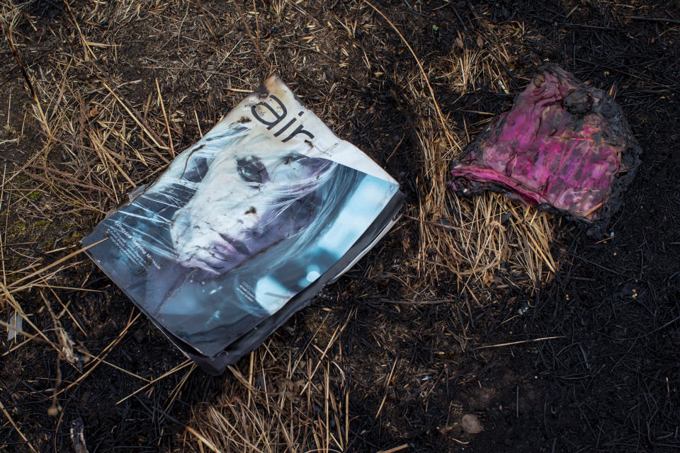 An 'Air' magazine is pictured at the site where the downed Malaysia Airlines flight MH17 crashed, near the village of Hrabove (Grabovo) in Donetsk region, eastern Ukraine September 9, 2014.  The Dutch are due to announce on Wednesday 28 September the long-awaited results of an investigation with Australia, Malaysia, Belgium and Ukraine into the July 17, 2014 downing of the flight.   REUTERS/Marko Djurica/File Photo          FROM THE FILES PACKAGE - SEARCH "FILES MH17" FOR ALL 20 IMAGES