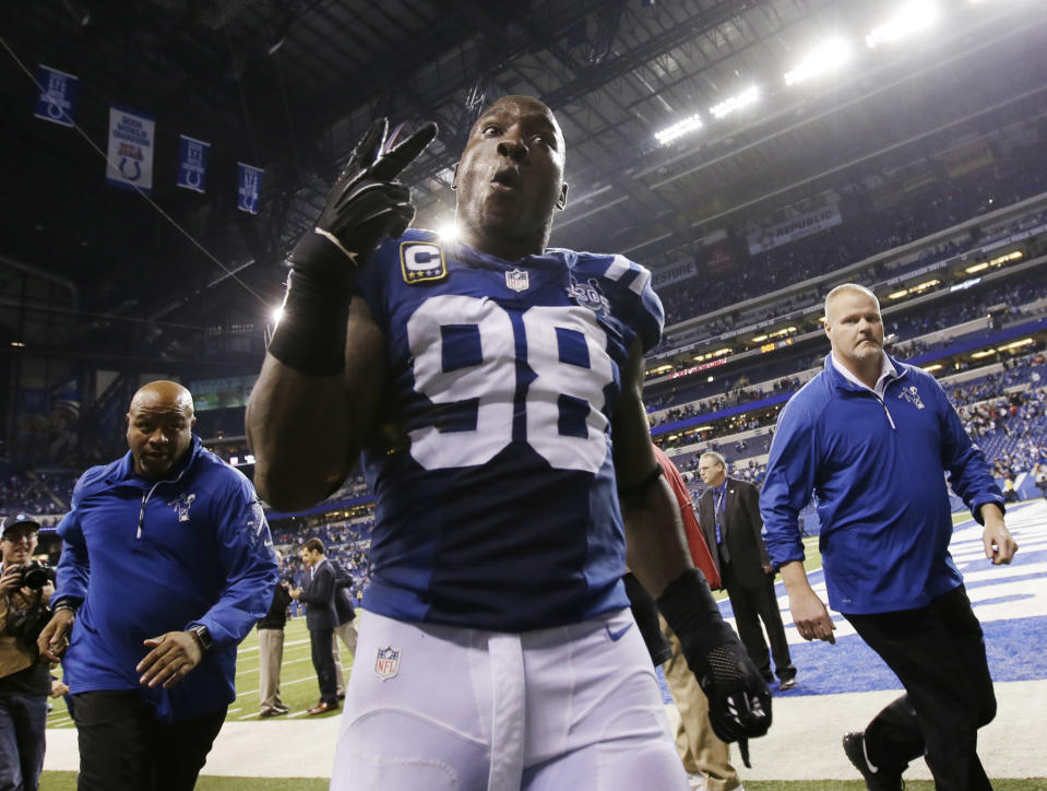 Indianapolis Colts' Robert Mathis (98) celebrates after an NFL wild-card playoff football game against the Kansas City Chiefs Saturday, Jan. 4, 2014, in Indianapolis. Indianapolis defeated Kansas City 45-44. (AP Photo/AJ Mast)