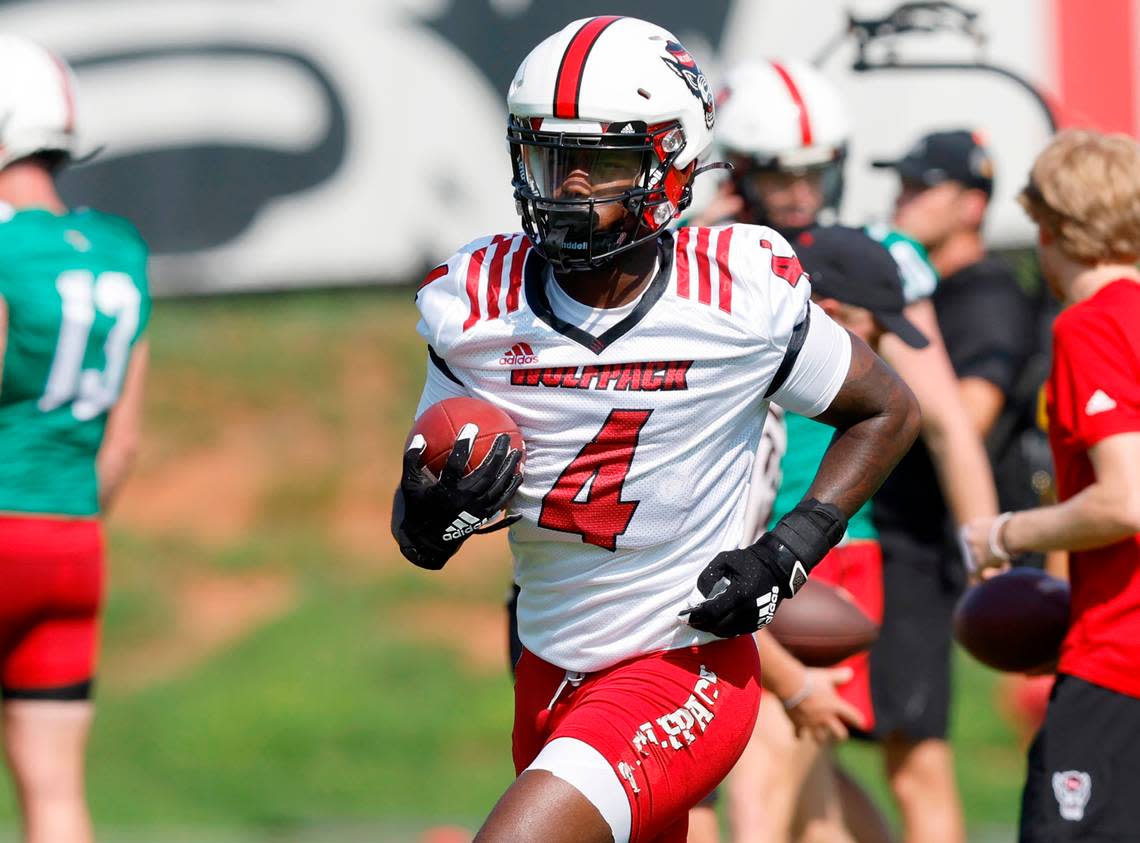 N.C. State wide receiver Porter Rooks (4) runs downfield during the Wolfpack’s first practice of fall camp in Raleigh, N.C., Wednesday, August 3, 2022.