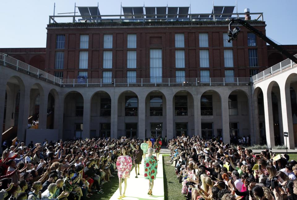 Models wear creations as part of the MSGM Spring-Summer 2020 collection, unveiled during the fashion week, in Milan, Italy, Saturday, Sept. 21, 2019. (AP Photo/Antonio Calanni)