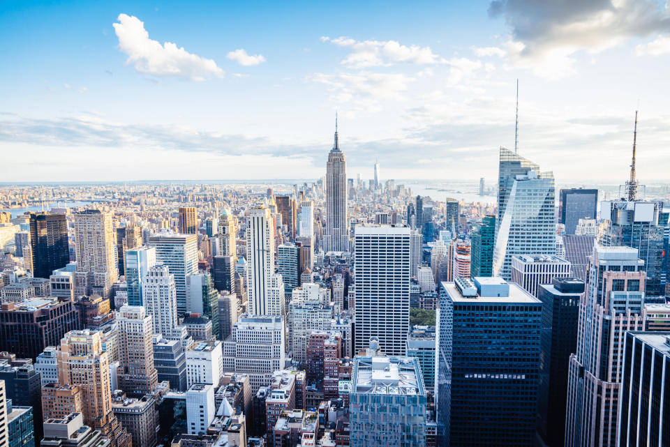 A skyline of Midtown Manhattan and the Empire State Building