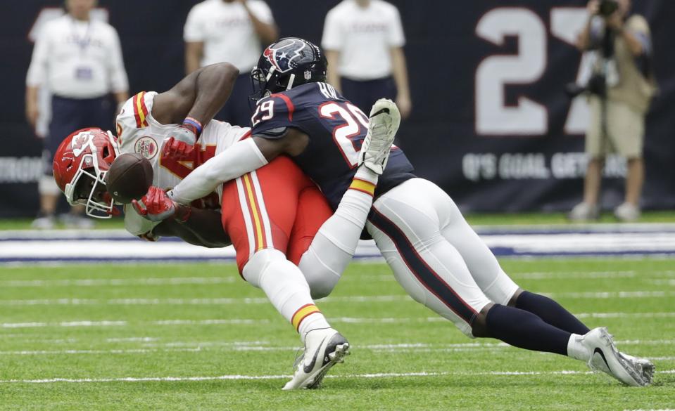 <p>Houston Texans free safety Andre Hal (29) breaks up a pass intended for Kansas City Chiefs tight end Demetrius Harris (84) during the first half of an NFL football game Sunday, Sept. 18, 2016, in Houston. (AP Photo/David J. Phillip) </p>