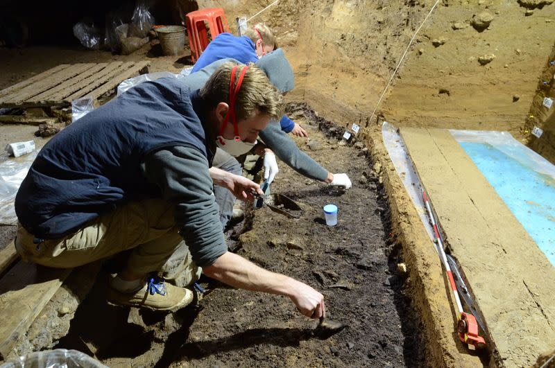 Researchers engage in excavations at Bacho Kiro Cave in Bulgaria