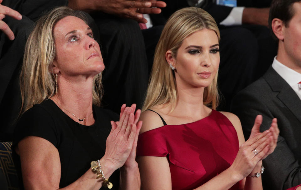 Trump, right, in a Roland Mouret off-the-shoulder dress [Photo: Getty]