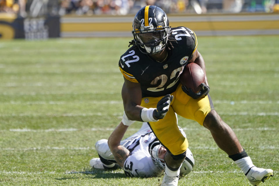 Pittsburgh Steelers running back Najee Harris (22) gets past defender Las Vegas Raiders defensive back Dallin Leavitt (32) en route to a touchdown during the second half of an NFL football game in Pittsburgh, Sunday, Sept. 19, 2021. (AP Photo/Keith Srakocic)