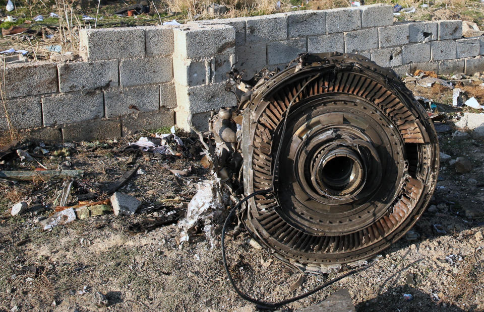 <em>NOTE: Graphic content - </em>An engine lies on the ground after a Ukrainian plane carrying 176 passengers crashed near Imam Khomeini airport in the Iranian capital Tehran early in the morning on January 8, 2020, killing everyone on board. - The Boeing 737 had left Tehran's international airport bound for Kiev, semi-official news agency ISNA said, adding that 10 ambulances were sent to the crash site. (Photo by -/AFP via Getty Images)