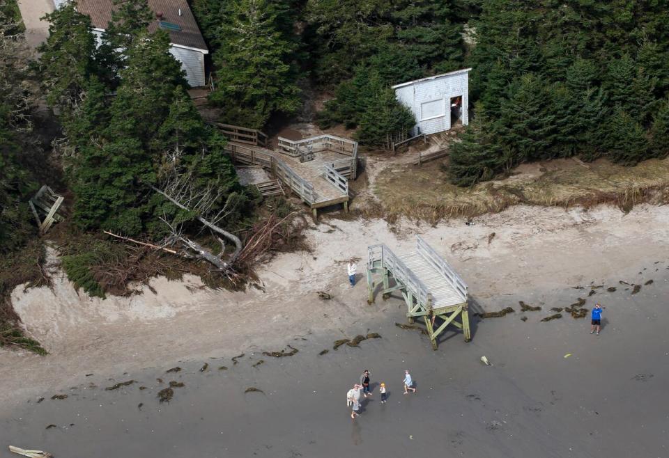 The broken boardwalk to the beach is shown following storm Lee last September. 