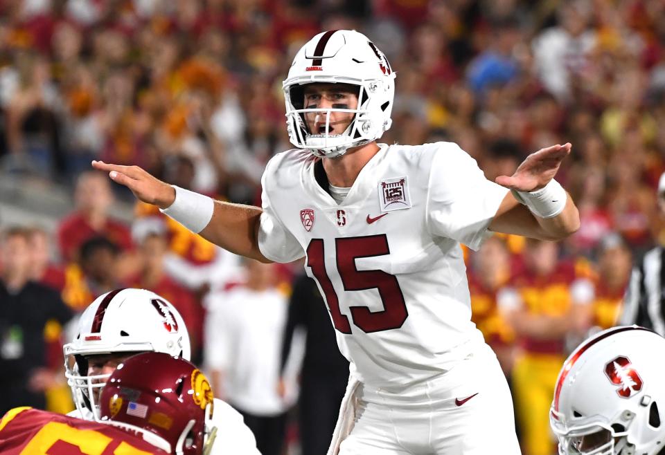 Quarterback Davis Mills of the Stanford Cardinal calls a play in the first quarter of the game against the USC Trojans at the Los Angeles Memorial Coliseum on September 7, 2019 in Los Angeles, California.