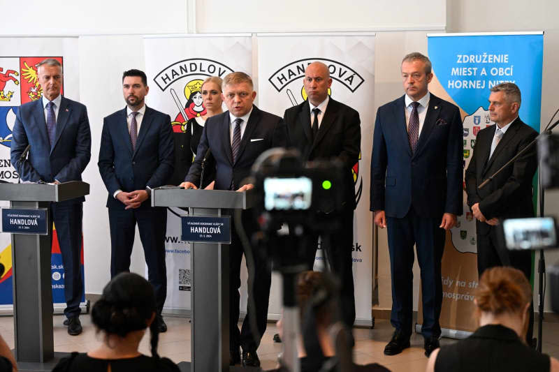 (L-R) Slovak Minister of Investment, Regional Development and Information Richard Rai, Minister of Agriculture and Rural Development Richard Takae, Deputy Prime Minister and Minister of Economy Denisa Sakova, Prime Minister Robert Fico and Minister of Transport Jozef Ra Jr. speak during a press conference after a government meeting in Handlova Radovan Stoklasa/TASR/dpa