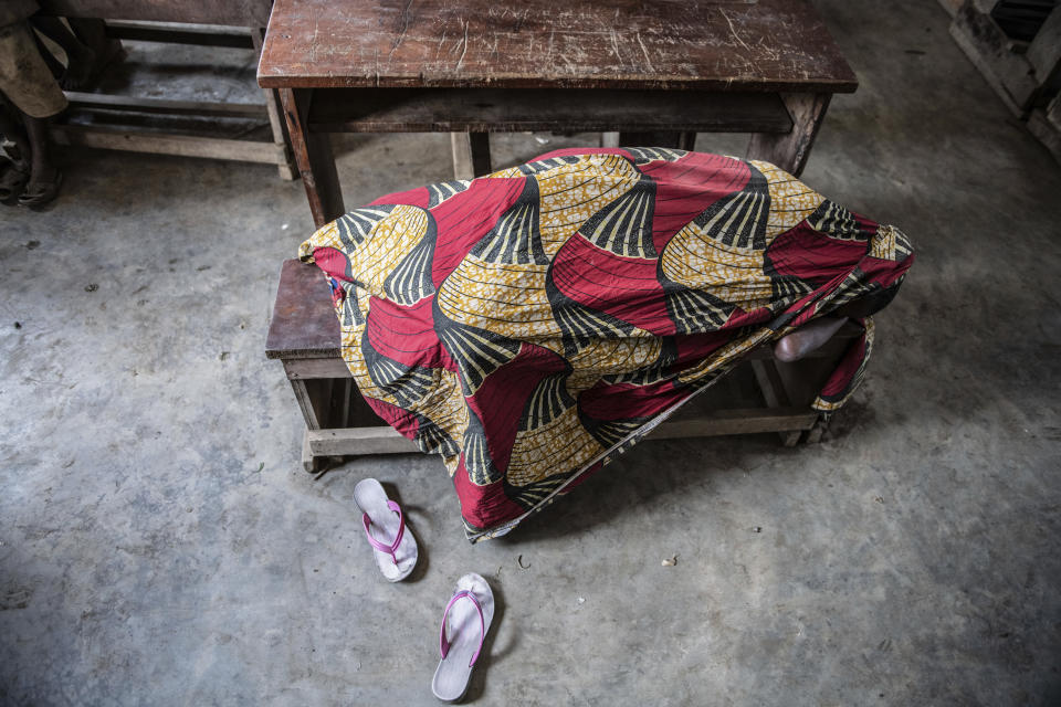 People fleeing the fighting between M23 forces and Congolese army find refuge in a church in Kibumba, north of Goma, Democratic Republic of Congo, Friday Jan. 28, 2022. In the past week, inhabitants from six villages in the country's east – including, Bukima, Nyesisi, and Ruhanga – have fled the violence. At least 2,000 people are now living in improvised shelters, in churches, schools or with host families. (AP Photo/Moses Sawasawa)