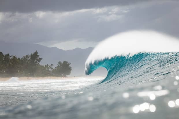 The ever-impressive Off The Wall left. While in the channel, us photographers get to enjoy some really impressive empty waves that explode on the OTW reef just south of Pipeline. Some waves like the one pictured look like an absolute dream.<p>Ryan "Chachi" Craig</p>