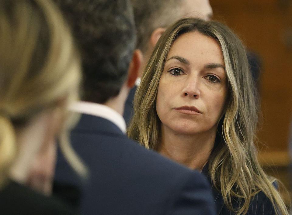 Karen Read watches as the jury enters the courtroom for the start of the second day of deliberation at Norfolk Superior Court in Dedham, Mass., Wednesday June 26, 2024. (Greg Derr/The Patriot Ledger via AP)