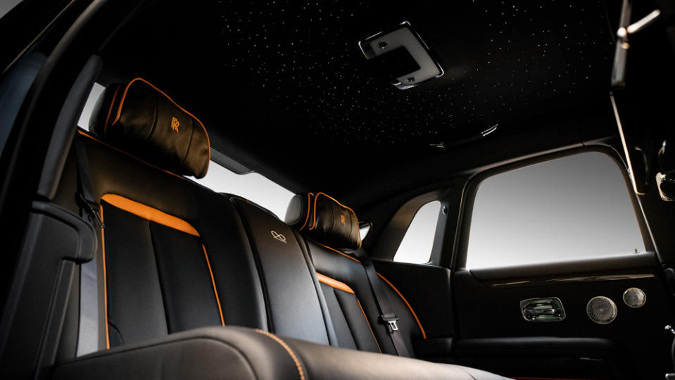 The marque’s customizable Starlight Headliner and Black Badge–specific accents add next-level exclusivity to an already rarified cabin. - Credit: Photo by Robb Rice.