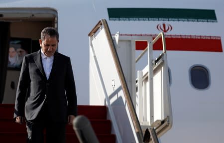 Iranian Vice President Jahangiri leaves the plane upon his arrival at Damascus international airport in Damascus