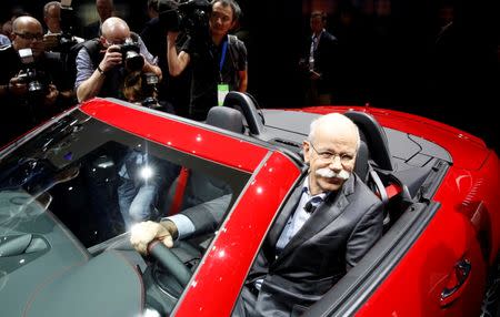 Dieter Zetsche, Chairman of the Board for Daimler AG and Head of Mercedes-Benz, sits in the 2016 Mercedes-AMG SLC 43 at the North American International Auto Show in Detroit, Michigan, January 11, 2016. REUTERS/Gary Cameron/File Photo