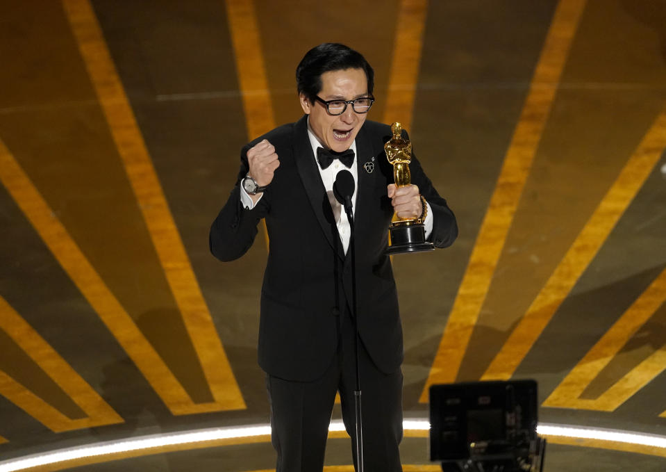 Ke Huy Quan accepts the award for best performance by an actor in a supporting role for "Everything Everywhere All at Once" at the Oscars on Sunday, March 12, 2023, at the Dolby Theatre in Los Angeles. (AP Photo/Chris Pizzello)