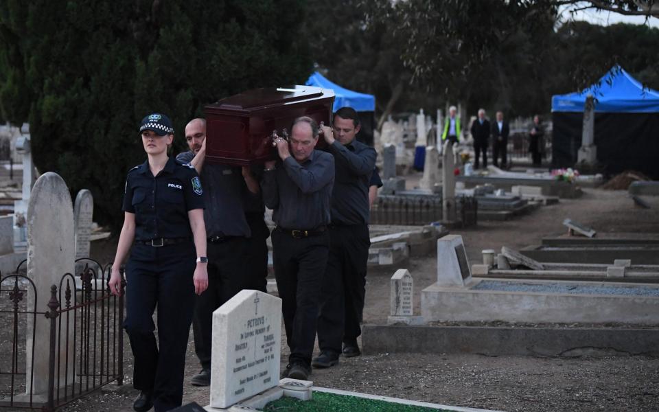South Australian police exhumed the remains of the so-called Somerton man  - AAP Image/Mark Brake