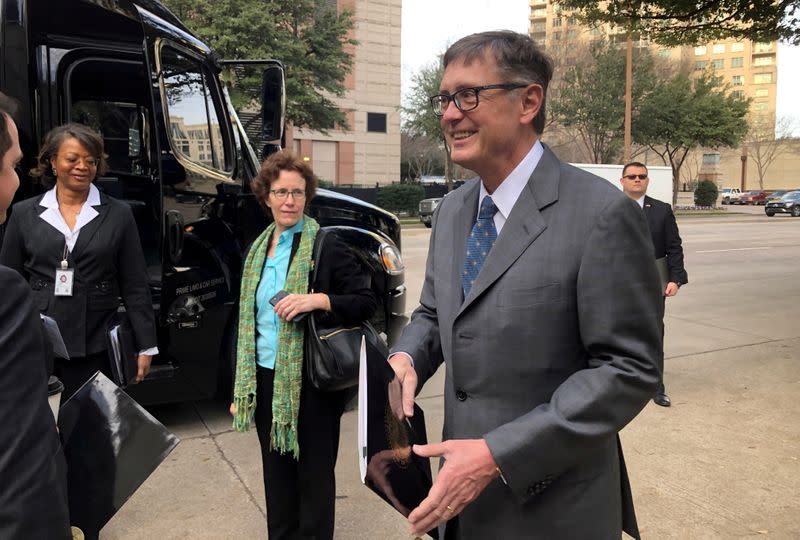 FILE PHOTO: Federal Reserve Vice Chairman Clarida boards a bus to tour South Dallas as part of a community outreach by U.S. central bankers in Dallas