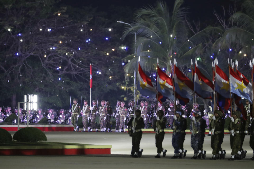 Myanmar military officers march during a parade to commemorate Myanmar's 79th Armed Forces Day, in Naypyitaw, Myanmar, Wednesday, March 27, 2024. (AP Photo/Aung Shine Oo)