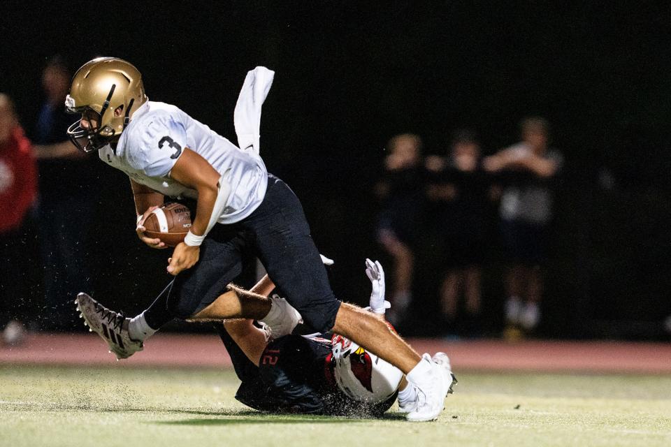 Westwood High School hosts River Dell in a football game in Washington Township on Friday September 16, 2022. (From left) RD #3 Maxwell Froonjian and W #12 Sean Morrison.