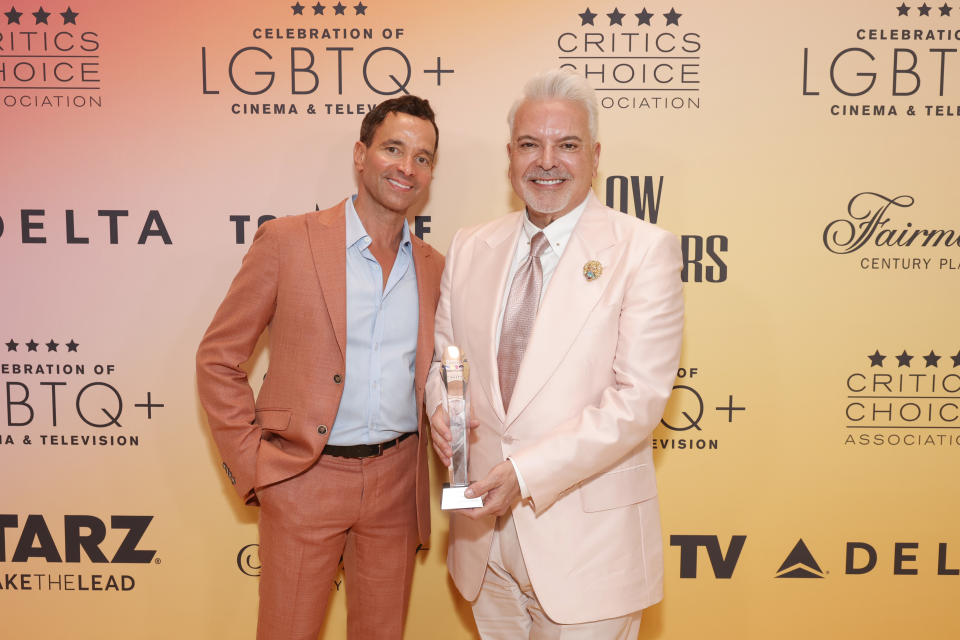 Co-CEO,Paramount Global and President & CEO of CBS George Cheeks and Henry R. Muñoz III, winner of the Industry Leadership Award (Photo by Emma McIntyre/Getty Images for Critics Choice Association)