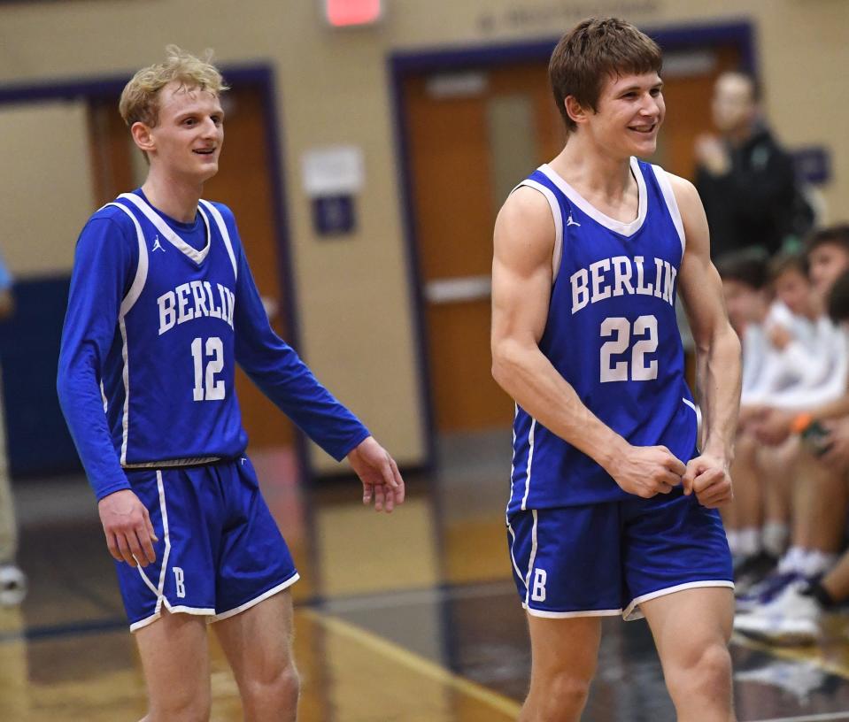 Berlin Brothersvalley’s Caden Montgomery (12) and Pace Prosser (22) come to the bench late in the Mountaineers' 63-45 win over Linville Hill Christian in a PIAA Class 1A boys basketball semifinal, March 20, in Chambersburg.