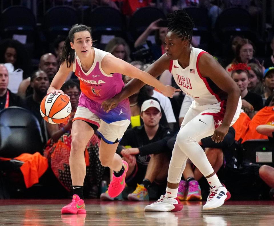 USA Team guard Chelsea Gray, a Modesto native, defends against Team WNBA guard Caitlin Clark during the WNBA All-Star Game in Phoenix on July 20.