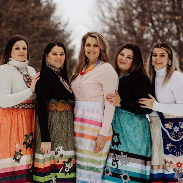 Karen Francis and daughters make beaded jewelry and ribbon skirts.