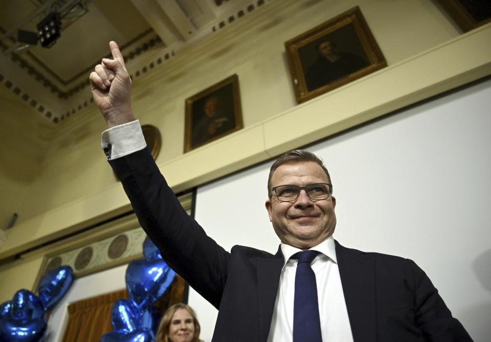 The National Coalition party Chairman Petteri Orpo celebrates with supporters at the party's parliament election party at the Ostrobotnia club in Helsinki, Finland on Sunday, April 2, 2023. Finland’s center-right National Coalition Party claimed victory with 94.2% of votes counted in an extremely tight three-way parliamentary race. They appeared to beat the ruling Social Democrats led by Prime Minister Sanna Marin. (Antti Aimo-Koivisto/Lehtikuva via AP)