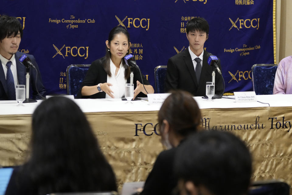 Taiwanese table tennis player Chiang Hung-chieh, right, former husband of Ai Fukuhara, Japanese table tennis star, attends a news conference with his lawyers at the Foreign Correspondents' Club of Japan (FCCJ) in Tokyo, Japan, Thursday, July 27, 2023. Japan’s once beloved table tennis star Ai Fukuhara is at the center of a child custody feud following the break-up of her marriage to a Taiwanese player who was also a star in the sport in his country. (AP Photo/Shuji Kajiyama)