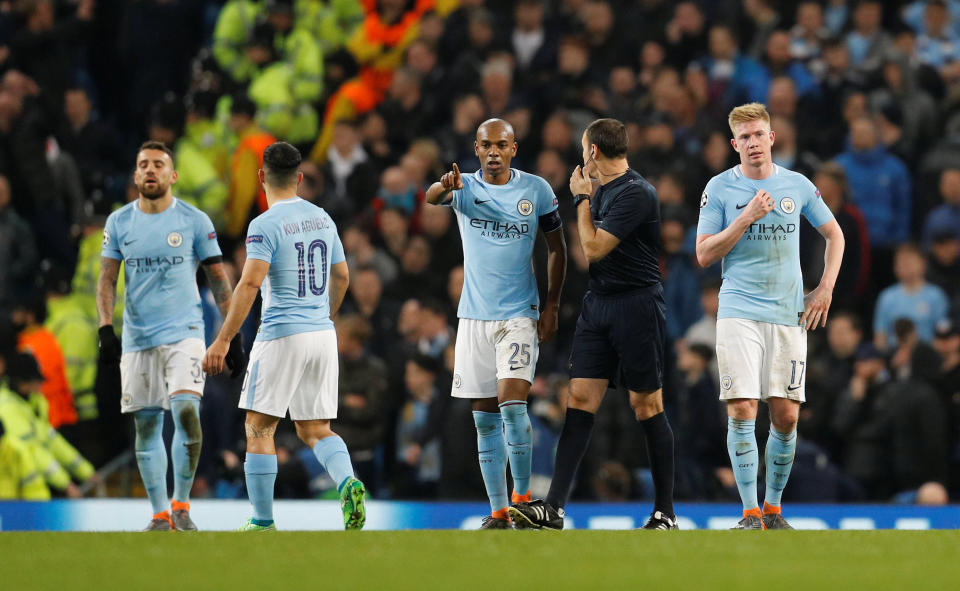 <p>Soccer Football – Champions League Quarter Final Second Leg – Manchester City vs Liverpool – Etihad Stadium, Manchester, Britain – April 10, 2018 (L – R) Manchester City’s Nicolas Otamendi, Sergio Aguero, Fernandinho and Kevin De Bruyne react after conceding their second goal scored by Liverpool’s Roberto Firmino REUTERS/Darren Staples </p>