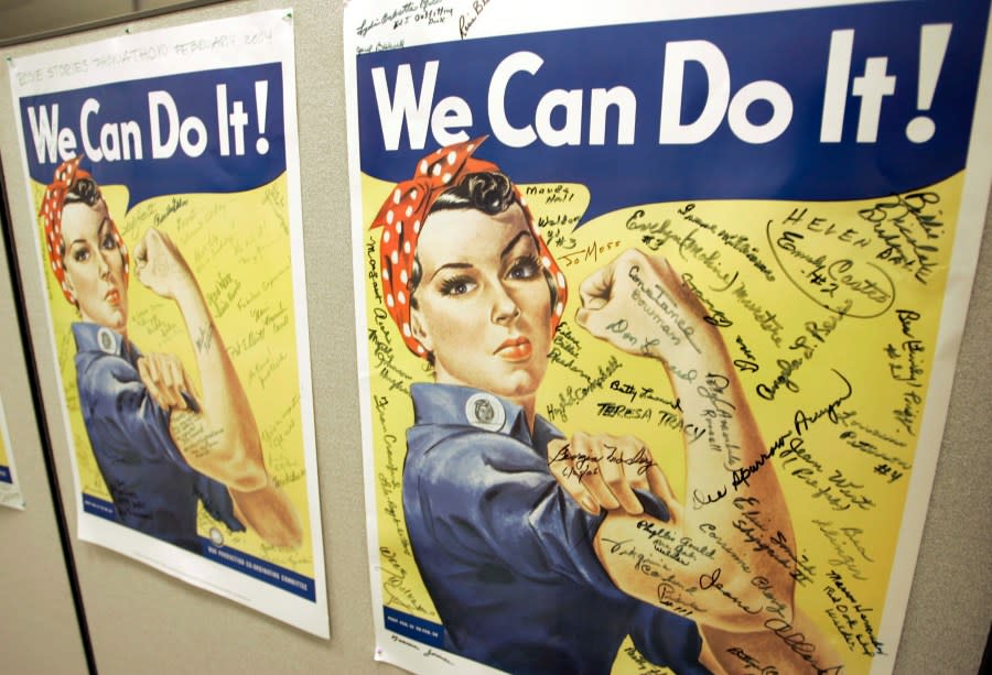 A poster showing signatures of former Rosie the Riveter's is seen at the offices of the Rosie the Riveter/World War II Home Front National Historic Park in Richmond, Calif., October 31, 2007 (AP Photo/Eric Risberg, File)