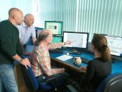 Dominic Stratford, Ron Clarke, Robert Atwood and Amelie Beaudet examine the results at the lab in Oxford