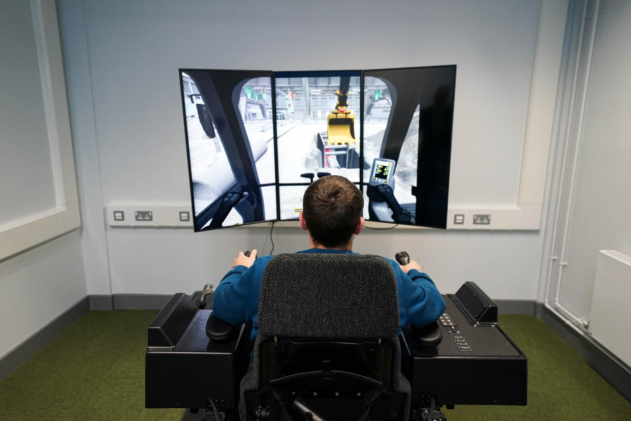 An inmate uses a construction simulator during the official opening of HMP Fosse Way, the new Category C prison in Leicester. Picture date: Thursday June 29, 2023. (Photo by Jacob King/PA Images via Getty Images)