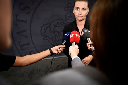 Denmark's Prime Minister Mette Frederiksen holds a news conference on explosion outside the Danish Tax Agency's office, at the Mirror Hall at Christiansborg in Copenhagen