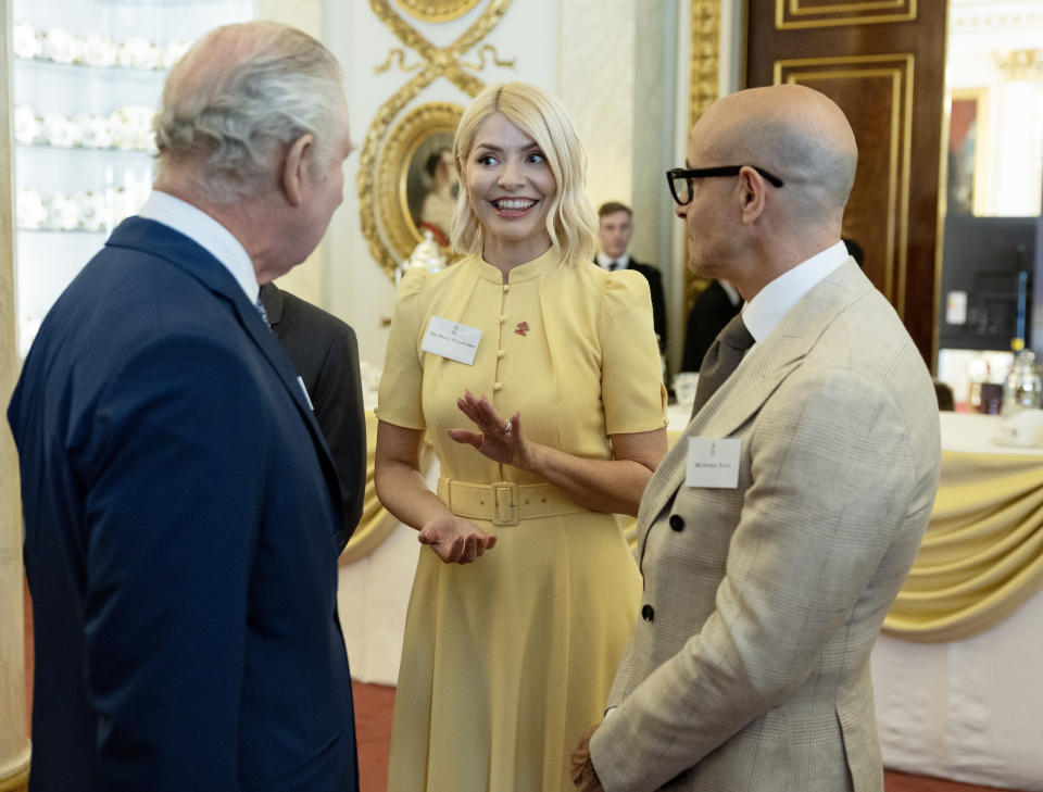 LONDON, ENGLAND - MAY 17: King Charles III meets Holly Willoughby and Stanley Tucci and he hosts the winners of the Prince's Trust awards and celebrity ambassadors at Buckingham Palace on May 17, 2023 in London, England. (Photo by Geoff Pugh-WPA Pool/Getty Images)