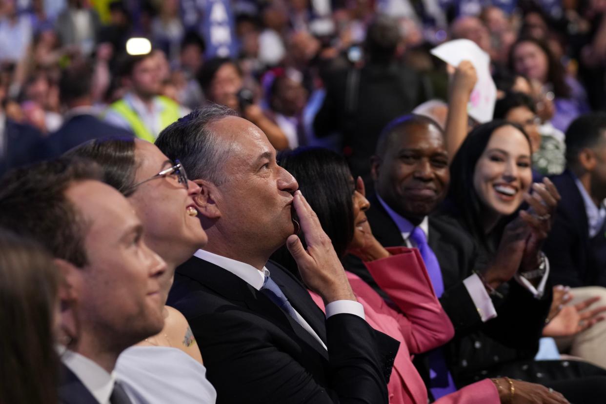 CHICAGO, ILLINOIS - AUGUST 22: Second gentleman Doug Emhoff  reacts as Democratic presidential candidate, U.S. Vice President Kamala Harris speaks on stage during the final day of the Democratic National Convention at the United Center on August 22, 2024 in Chicago, Illinois. Delegates, politicians, and Democratic Party supporters are gathering in Chicago, as current Vice President Kamala Harris is named her party's presidential nominee. The DNC takes place from August 19-22. (Photo by Andrew Harnik/Getty Images) (Getty Images)