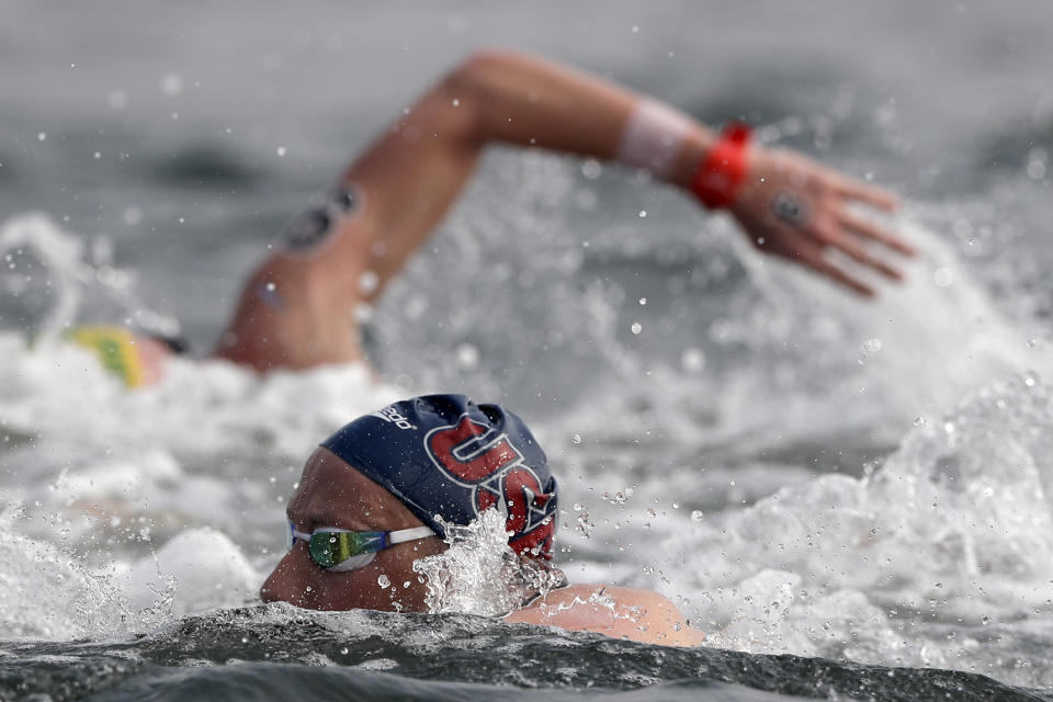 Jordan Wilimovsky of the United States competes in the men's 10km open water swim at the World Swimming Championships in Yeosu, South Korea, Tuesday, July 16, 2019. (AP Photo/Mark Schiefelbein)