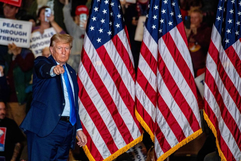 Former President Donald Trump leaves after speaking at a campaign rally in Claremont, New Hampshire, on November 11, 2023.