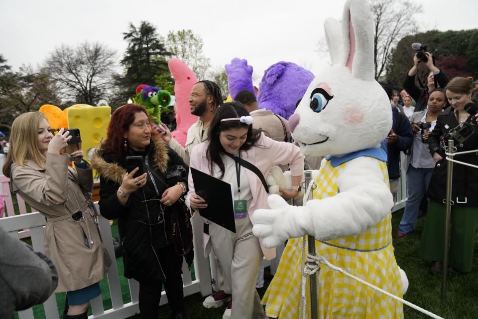 A person in an Easter Bunny costume attends the annual White House Easter Egg Roll on on Monday in Washington. In addition to the traditional egg roll and egg hunt, first lady Jill Biden continues last year's theme of “EGGucation” with educational activities and special performances on the South Lawn.