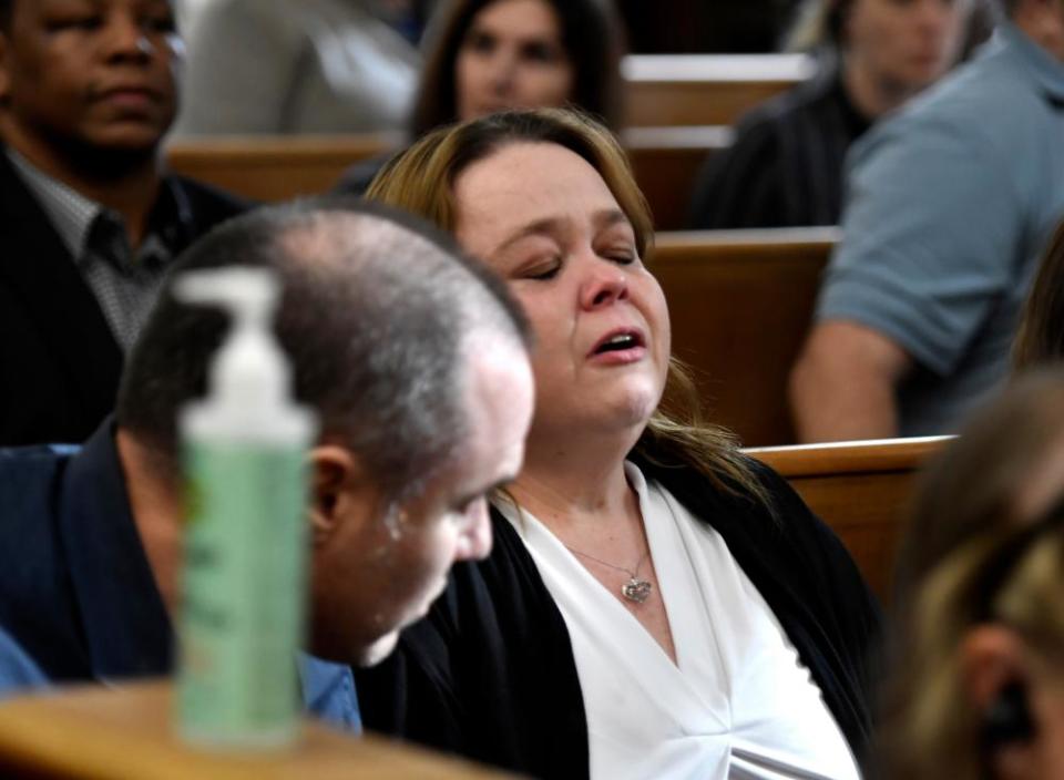 Kyle Rittenhouse’s mother, Wendy Rittenhouse, reacts with relief as her son is found not guilty on Friday.