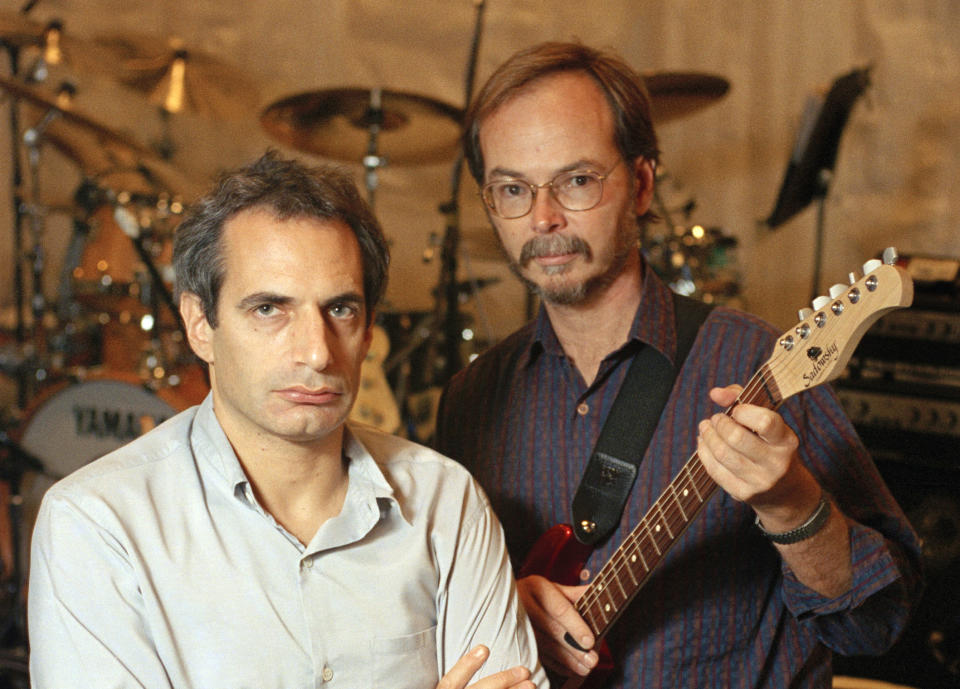 FILE - Donald Fagen, left, and Walter Becker of Steely Dan pose at New York's S.I.R. Studios on Aug. 5, 1993, before a rehearsal for their upcoming tour. Becker died in 2017. Steely Dan, R.E.M., Timbaland, Hillary Lindsey and Dean Pitchford will be inducted into the Songwriters Hall of Fame. The induction ceremony will be held on June 13 in New York. (AP Photo/Richard Drew, File)