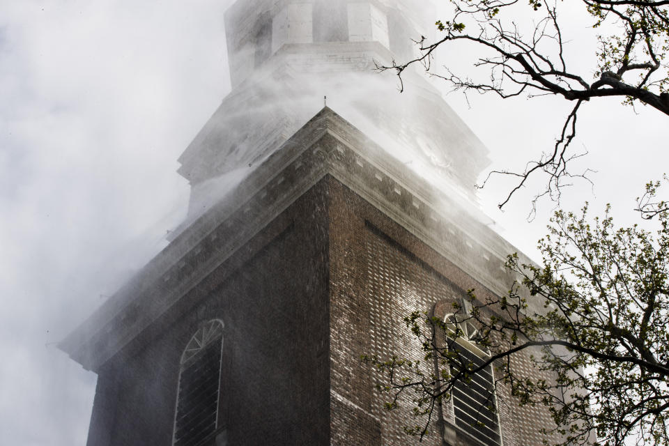 The historic Christ Church test its fire suppression system ahead of summer renovations in Philadelphia, Wednesday, April 17, 2019. (AP Photo/Matt Rourke)